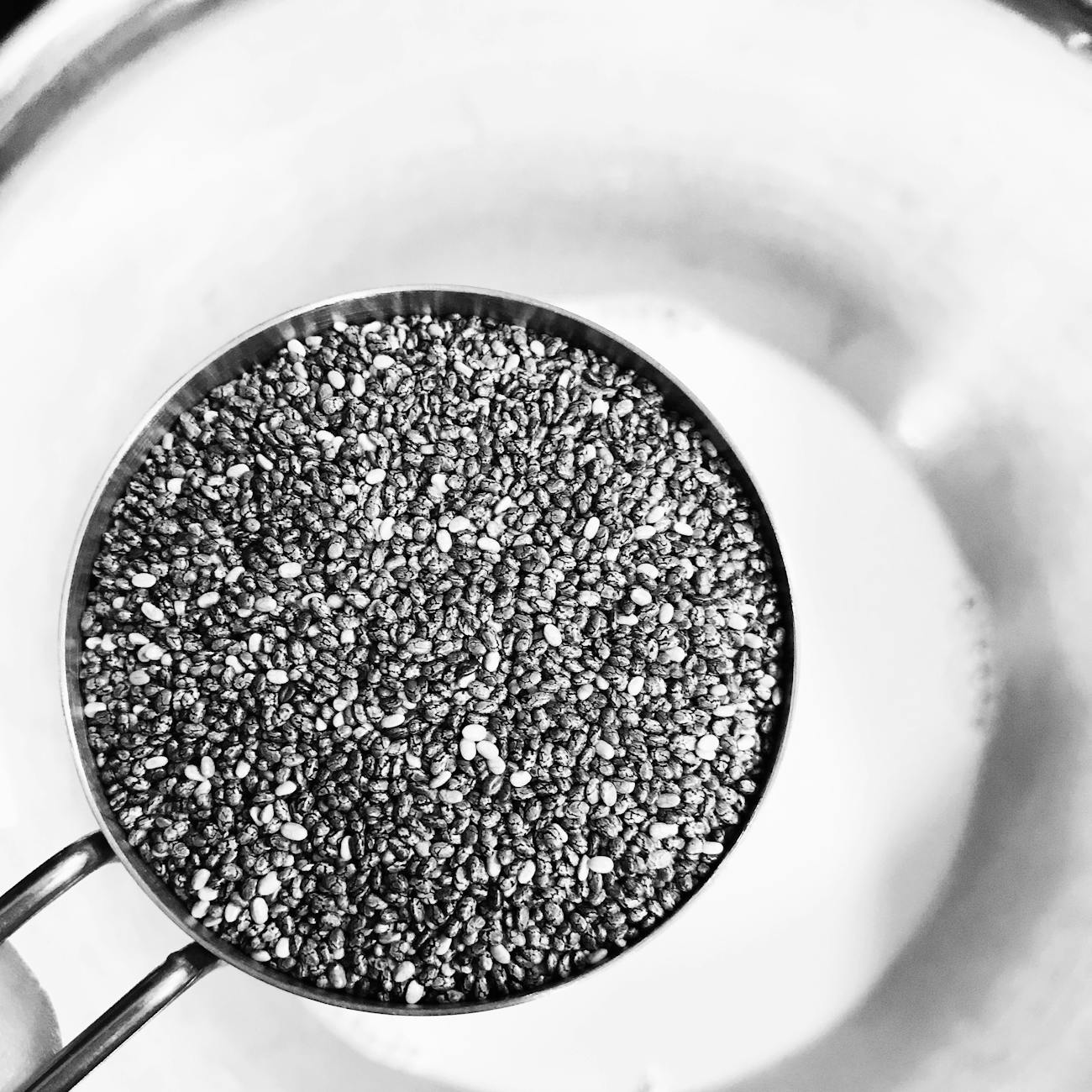 grayscale photography of grains on cook pot